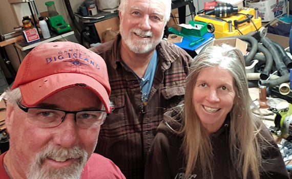 Jeff, N6JWT, George, N6GEO, and Ginger, KM6RFT, in George's shop and radio shack.